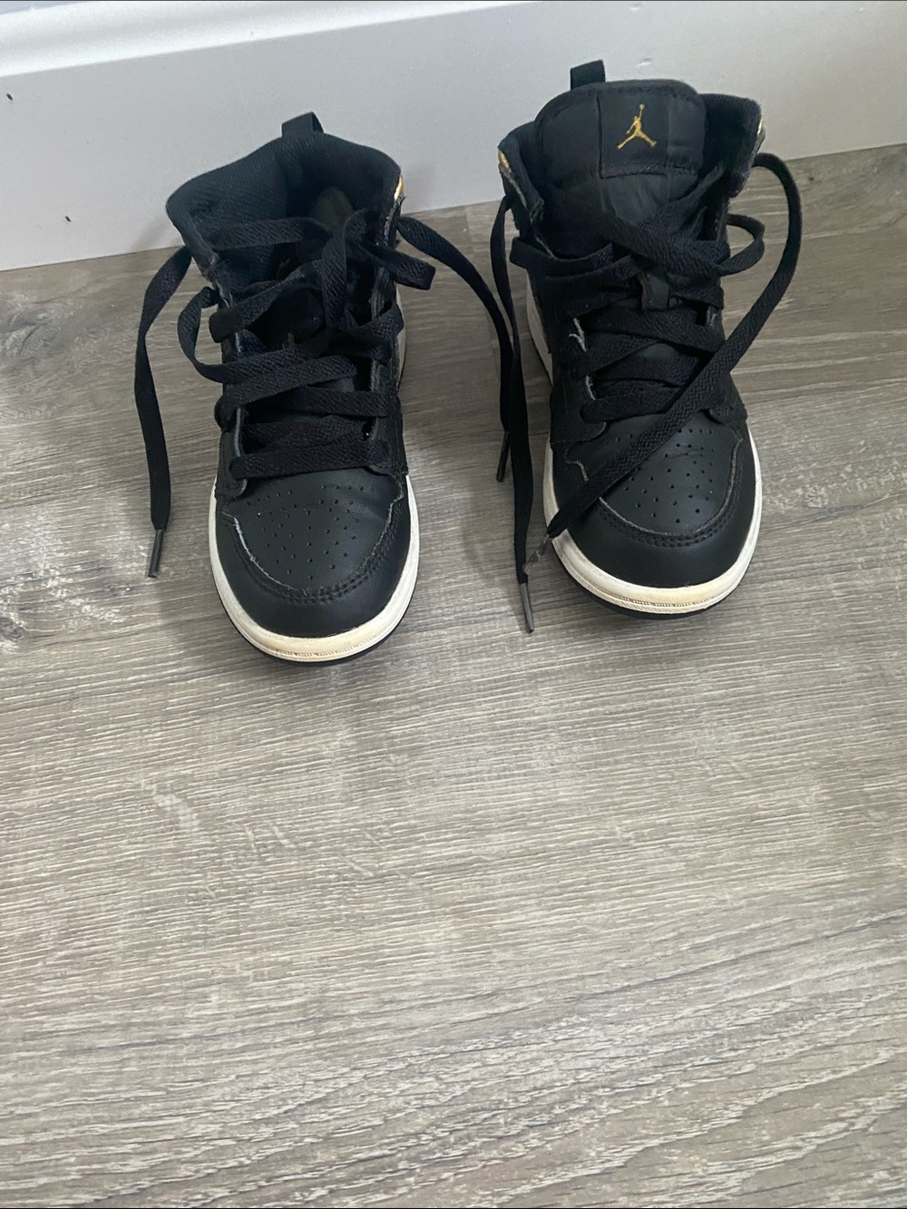 Jordan Kids Black and Gold High-Top Sneakers